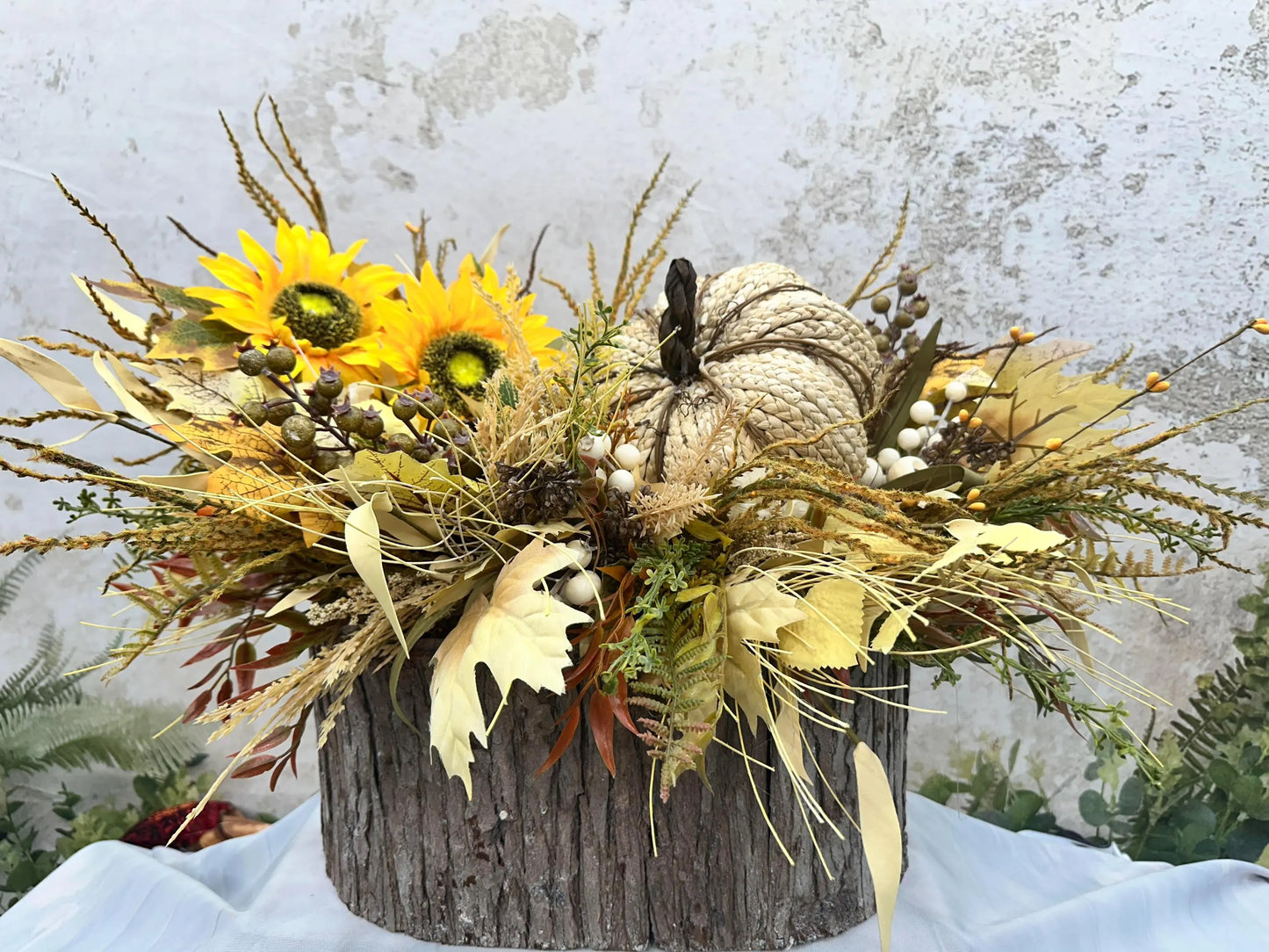 FALL CENTERPIECE IN LOG CONTAINER