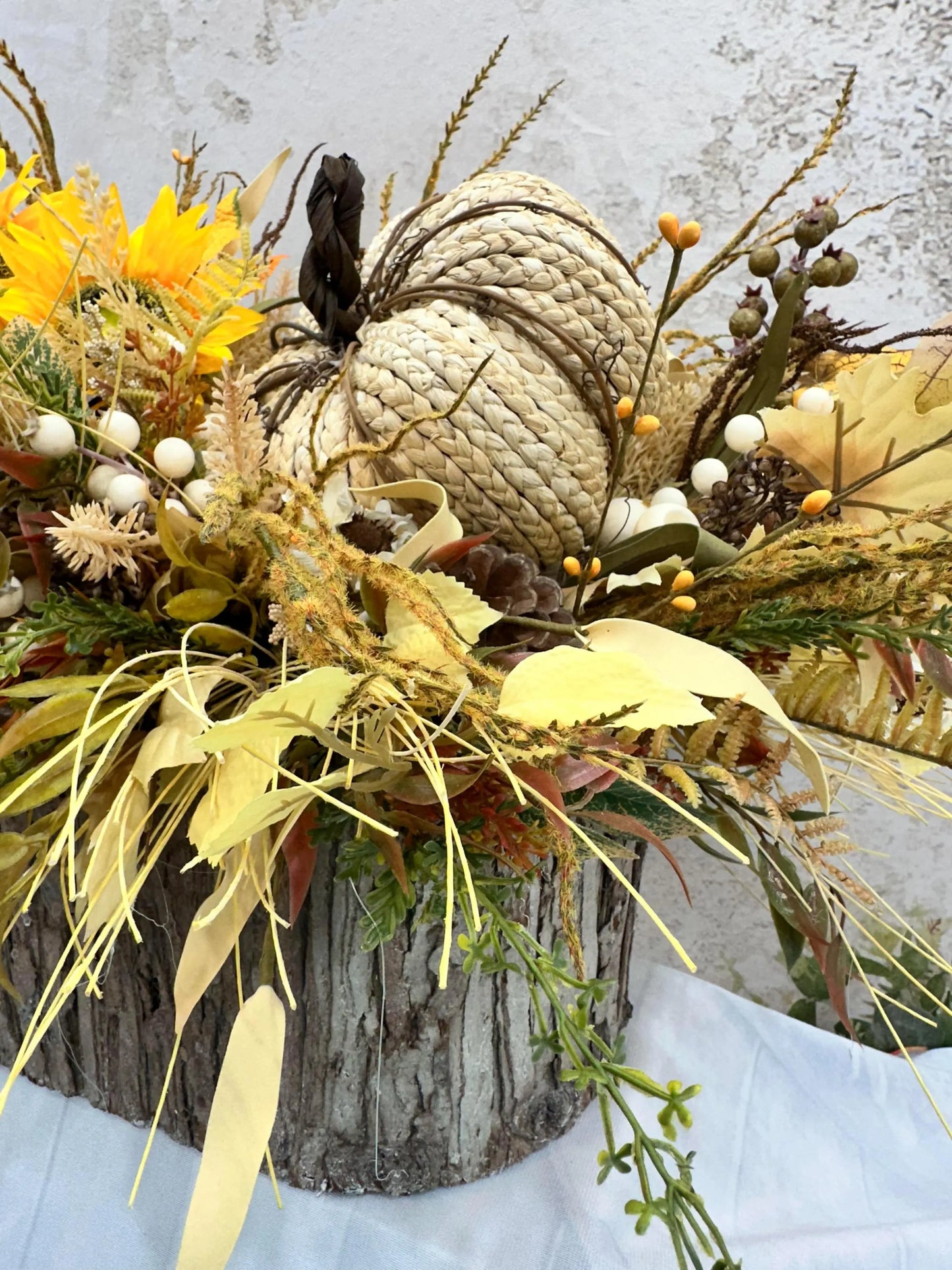 FALL CENTERPIECE IN LOG CONTAINER