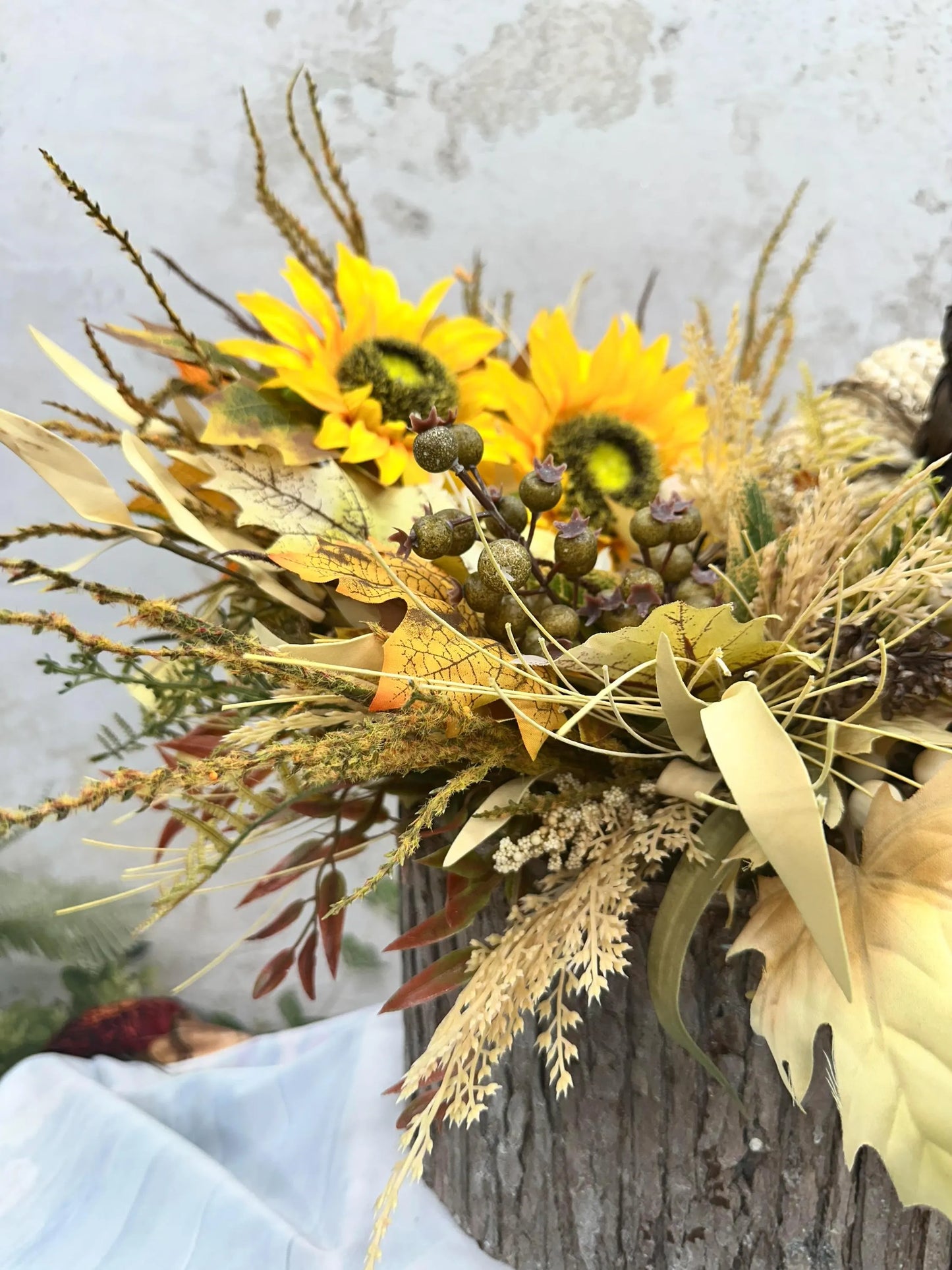 FALL CENTERPIECE IN LOG CONTAINER