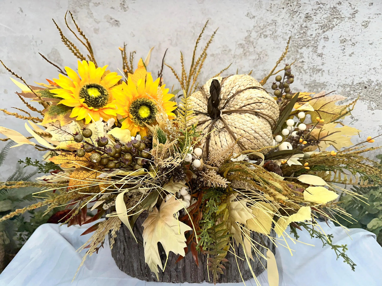FALL CENTERPIECE IN LOG CONTAINER