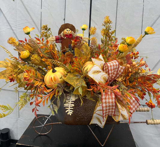 FALL FOLIAGE CENTERPIECE IN A WHEELBARROW