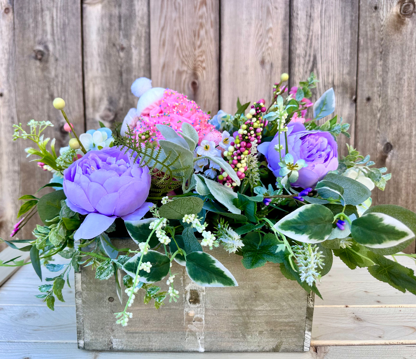 Spring basket with bunny cupcake centerpiece