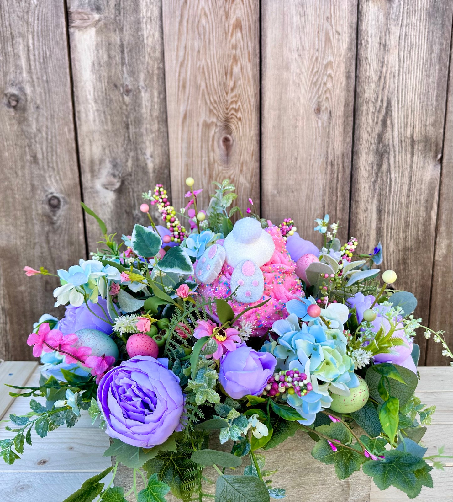 Spring basket with bunny cupcake centerpiece