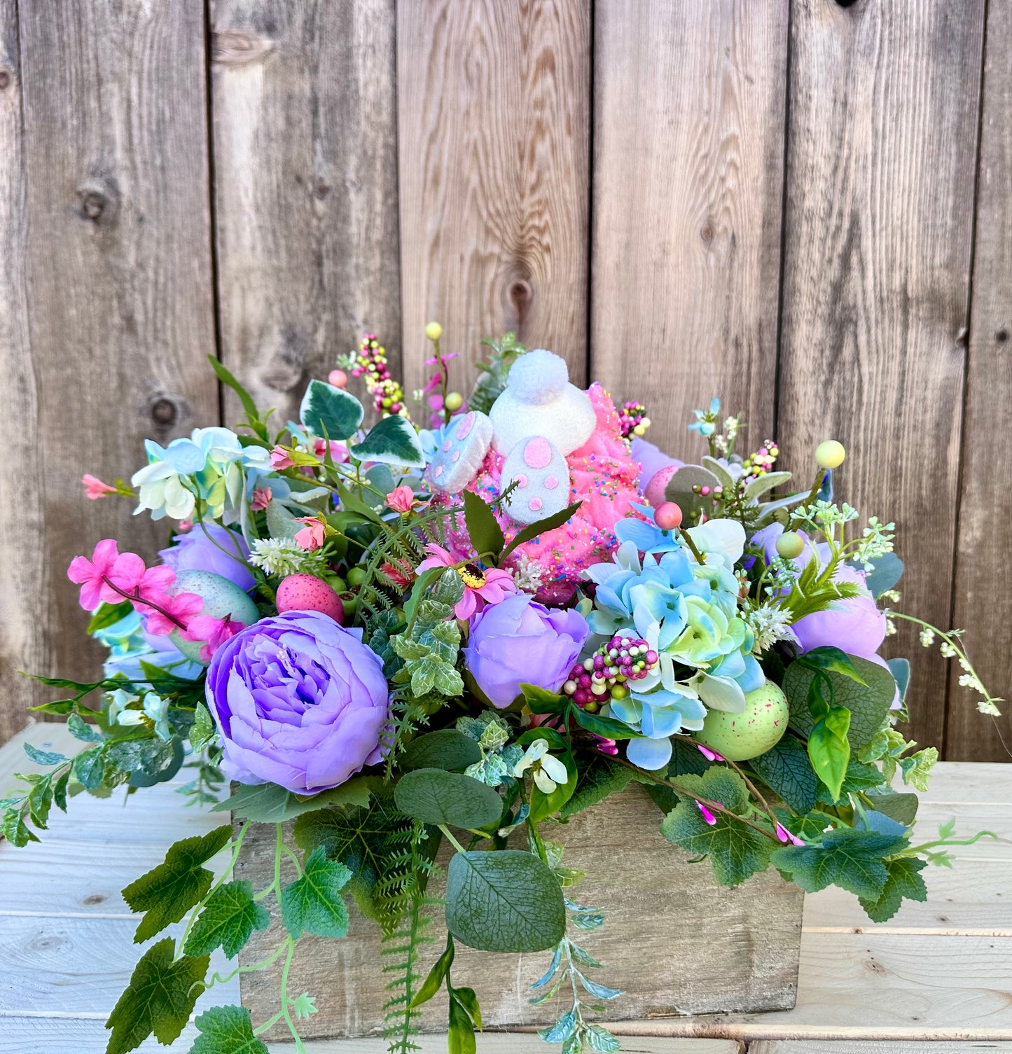 Spring basket with bunny cupcake centerpiece