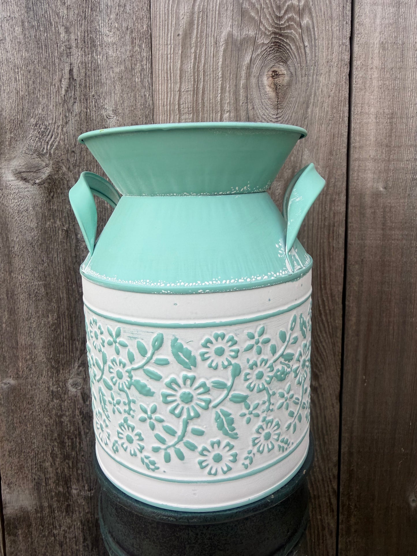 Embossed Daisy Milk Can    KE232999