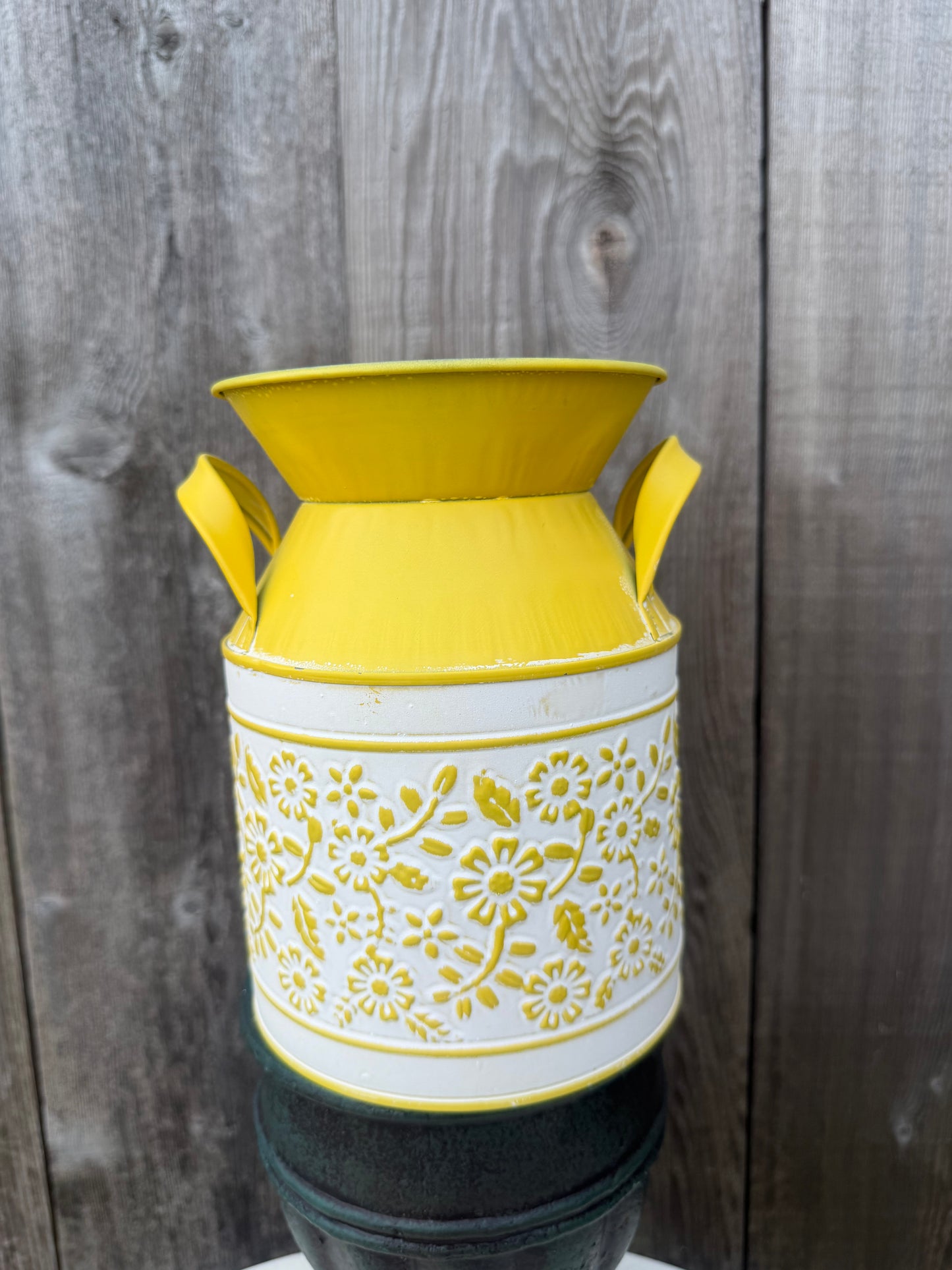 Embossed Daisy Milk Can    KE232999