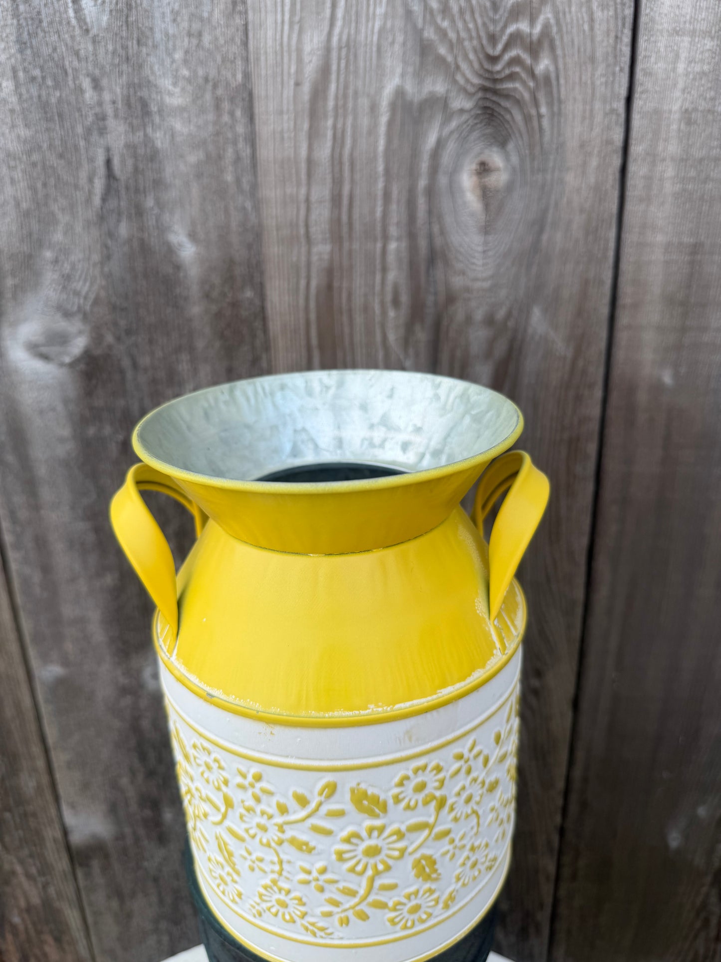 Embossed Daisy Milk Can    KE232999