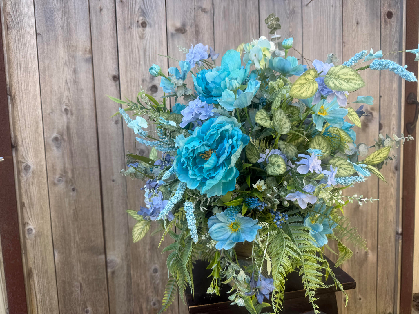 SPRING CENTERPIECE WITH VIBRANT BLUE FLORALS