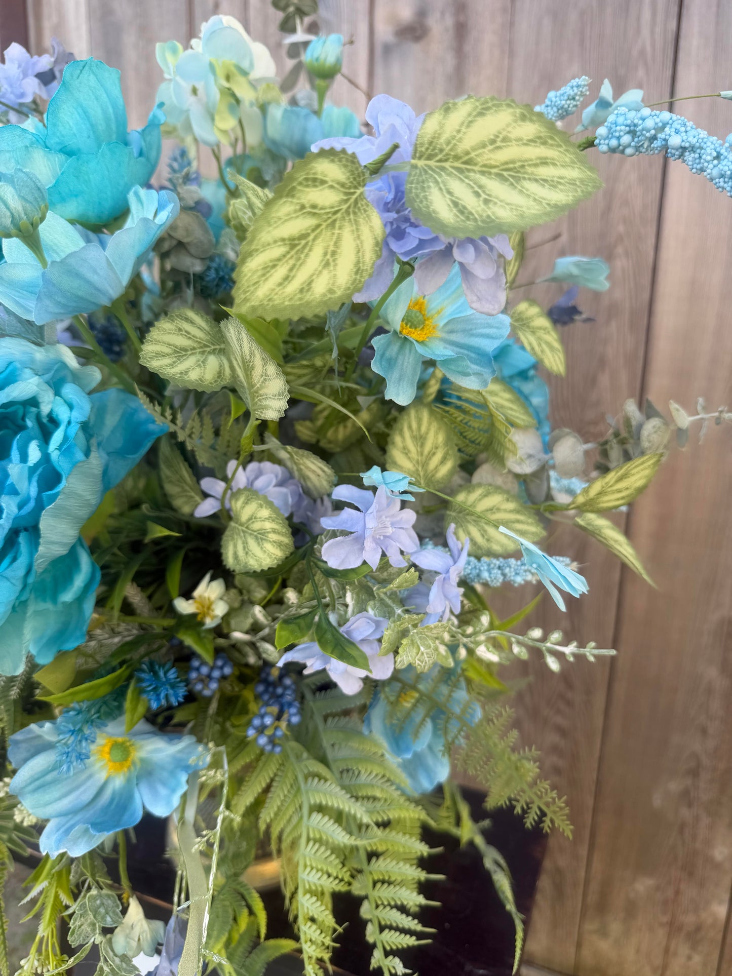 SPRING CENTERPIECE WITH VIBRANT BLUE FLORALS