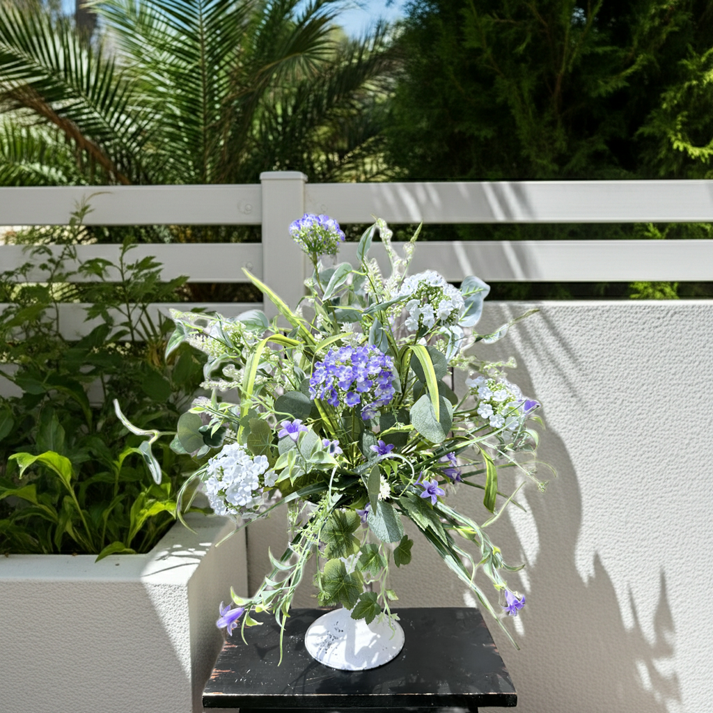 WHITE AND LAVENDER CANDLESTICK CENTERPIECE