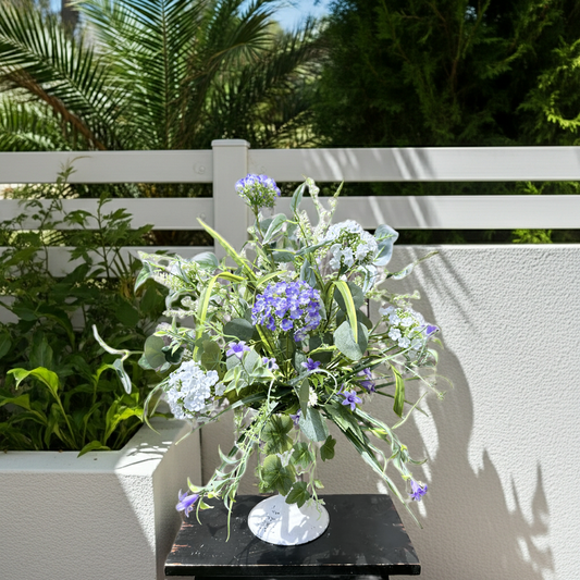 WHITE AND LAVENDER CANDLESTICK CENTERPIECE
